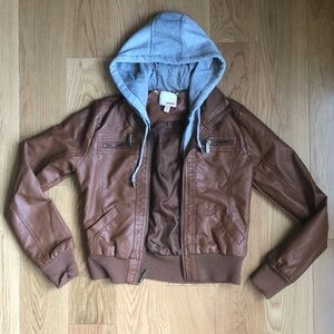 Woman’s medium brown leather jacket